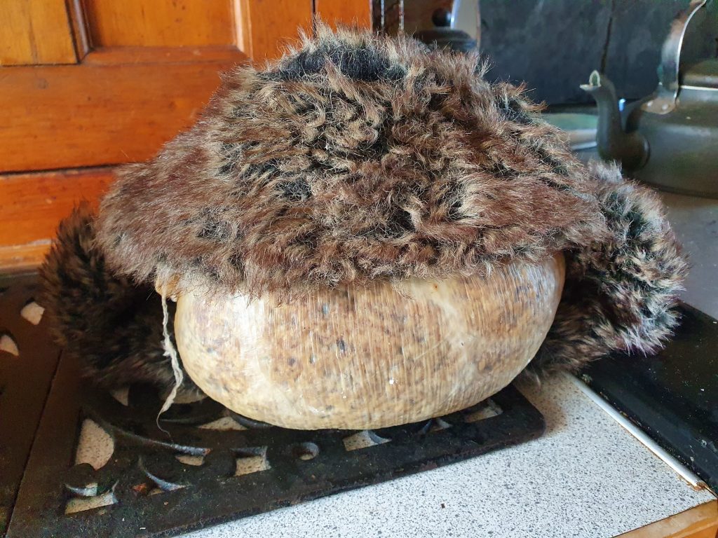 Haggis with a furry hat on it